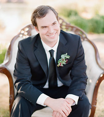 Groom at a wedding smiling